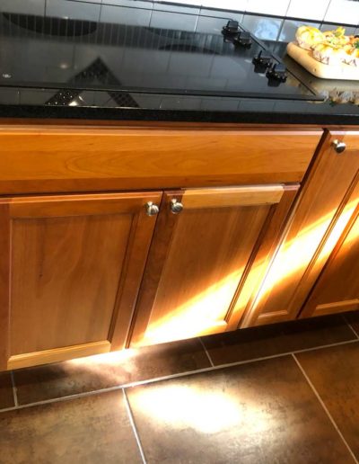 walnut cabinets in a kitchen